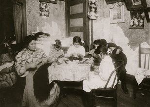 Italian Families manufacture feathers from their tenement apartment 1911