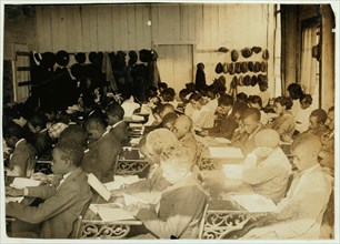 75 Sixth Grade children (colored) crowded into 1 small room in an old store building near Black High School, with 1 teacher 1917