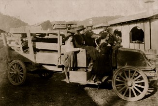 A 4 H family bringing in their exhibits (pig, sheep, poultry) to the annual 4 H Fair at Charleston, W. Va 1921