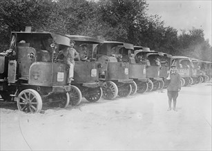 A Fleet of Trucks each with its own Driver is arrayed and ready to transport troops. 1918