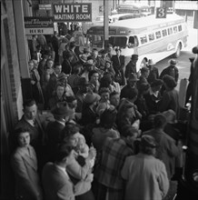 A Greyhound bus trip from Louisville, Kentucky, to Memphis, Tennessee, and the terminals. Passengers standing in aisles on Memphis-Chattanooga Greyhound bus 1943