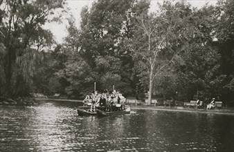 A Group of Children out for a Ride with Their Teachers on the Swan Boats on Frog  1910