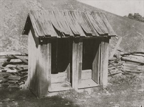 A poor toilet, of the old style at Buzzard School. These will be replaced later by concrete toilets. 1921