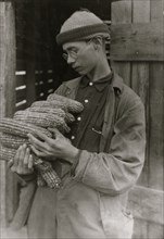 A Product of the 4 H Club, raised 135 bushels of corn on one acre (his father raised about one half as much and complained that the boy's land was better 1921