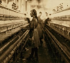 A spinner in the Mollahan Mills, Newberry, S.C. 1908