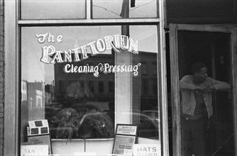 African American A cleaning and pressing shop in Urbana, Ohio 1935