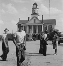African American and whites outside a Southern City Hall with a statue of a Confederate soldier in front 1939
