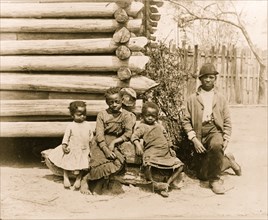 African American man and three children 1888