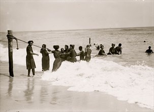 African American Women swimming in AsburyPark Surf off the JerseyCoast 1908