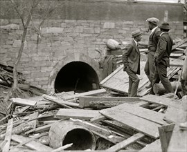 African Americans examine the build up of detritus from Flood in Washington, DC 1923