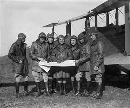 American Service Aviators go over Map in Deciding on Flight Plan 1924