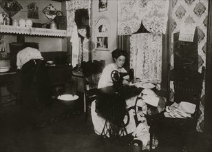 Jewish woman manufactures lace from their tenement apartment 1911
