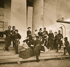 Gen. Samuel P. Heintzelman and staff at Arlington house. (Mathew B. Brady, the photographer is shown in a top hat) 1863
