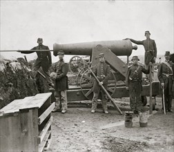 Arlington, Virginia. Soldiers of 4th New York heavy Artillery loading 24-pdr. siege gun on wooden barbette (Ingalls Battery? Fort Corcoran) 1862