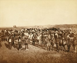 At the Dance. Part of the 8th U.S. Cavalry and 3rd Infantry at the great Indian Grass Dance on Reservation 1890