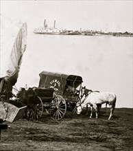 Belle Plain Landing, Virginia. Distance view of Belle Plain Landing on the James River. (U.S. Mail wagon 2nd Corps in foreground 1864