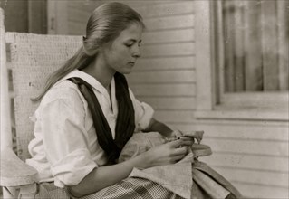 Betsey Price, First year high school at her Club sewing. 4 H Club work, Marlinton, W. Va. Location 1921