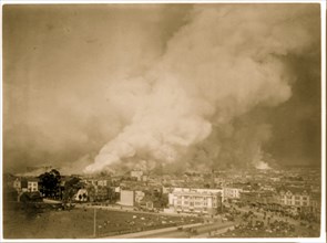 Bird's-eye view of smoldering downtown section during the San Francisco earthquake and fire 1906