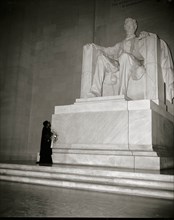 Marion Anderson before a statute of President Lincoln in the Memorial in DC 1939