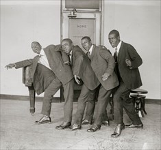 Black singing and dancing group