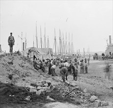 Blackes working along the wharf 1863