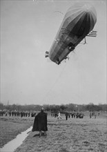 Blimp, Zeppelin No. 3, in shed, seen from water