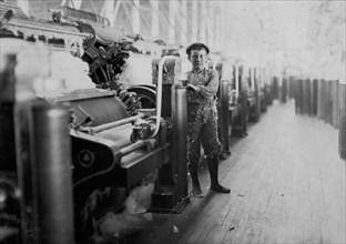 Boy Sweeper, Lincoln Cotton Mills, Evansville, Ind. Carding Machines: Floor Slippery.  1908