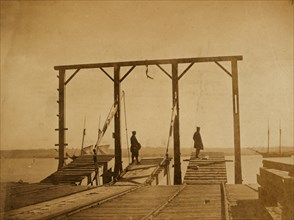 Bridges by means of which cars are loaded upon or unloaded from arks or barges 1863