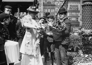 Buying Easter flowers in Union Square, New York