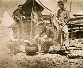 Camp of 71st New Vols. Cook house Soldiers getting dinner ready 1863