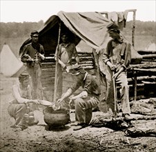Camp of 71st New Vols. Cook house Soldiers getting dinner ready. 1861