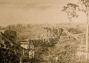 Catlett's Station, Va., vicinity. Federal soldiers rebuilding the Orange & Alexandria Railroad bridge over Cedar Run 1863