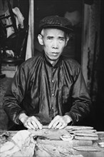 Chinese Cigar Maker in Native Costume 1920