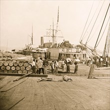 City Point, Virginia. Blackes working along the wharf 1863