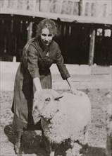 Clementine Miller (and her parents) with her sheep exhibit at the 4 H Club Fair, Charleston, W. Va.  1921