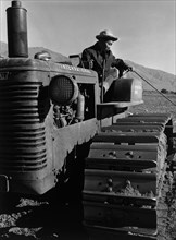 Benji Iguchi on tractor 1943