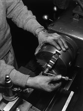 Hands of lathe worker 1943