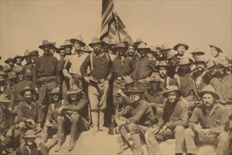 Colonel Roosevelt and his Rough Riders at the top of the hill which they captured, Battle of San Juan 1898