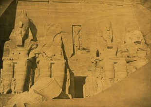Colossal sculptures of Ramses II at entrance to the Great Temple at Abu Simbul, Egypt 1880