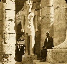 Colossal statue of Ramses II among the columns of the Temple of Luxor, Egypt 1908