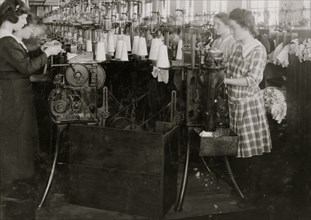 Continuation school girls topping stockings in Ipswich Mills 1917