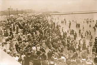 Crowds on the beach at Coney Island, New York