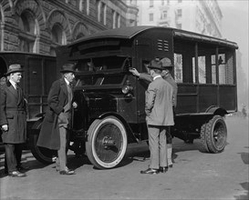Delivery of New Mail Truck Inspected by four men 1921