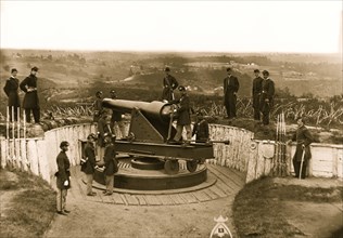 Massachusetts Heavy Artillery, and crew of 100-pdr. Parrott gun on iron barbette carriage at Fort Totten 1865