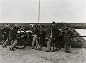 District of Columbia. Sergeants of 3d Massachusetts Heavy Artillery, with gun and caisson at Fort Totten 1865