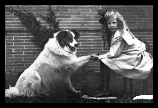 Girl Shaking Hands with Dog 1900