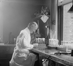 Dr. Edward Francis, bacteriologist in his laboratory 1923