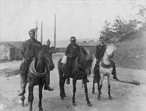 Going home, riding their horses after a day at the mine 1908