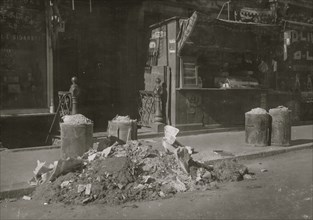 Entrance to tenements, 53 to 59 MacDougal St., N.Y., (licensed) in which coats and flowers are made.  1912