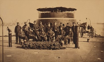 Fifteen officers on deck of the original "Monitor" 1863